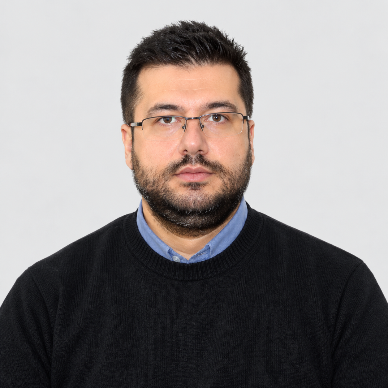 Doç. Dr. Erman Benli